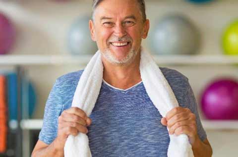 Man with a towel wrapped around his neck